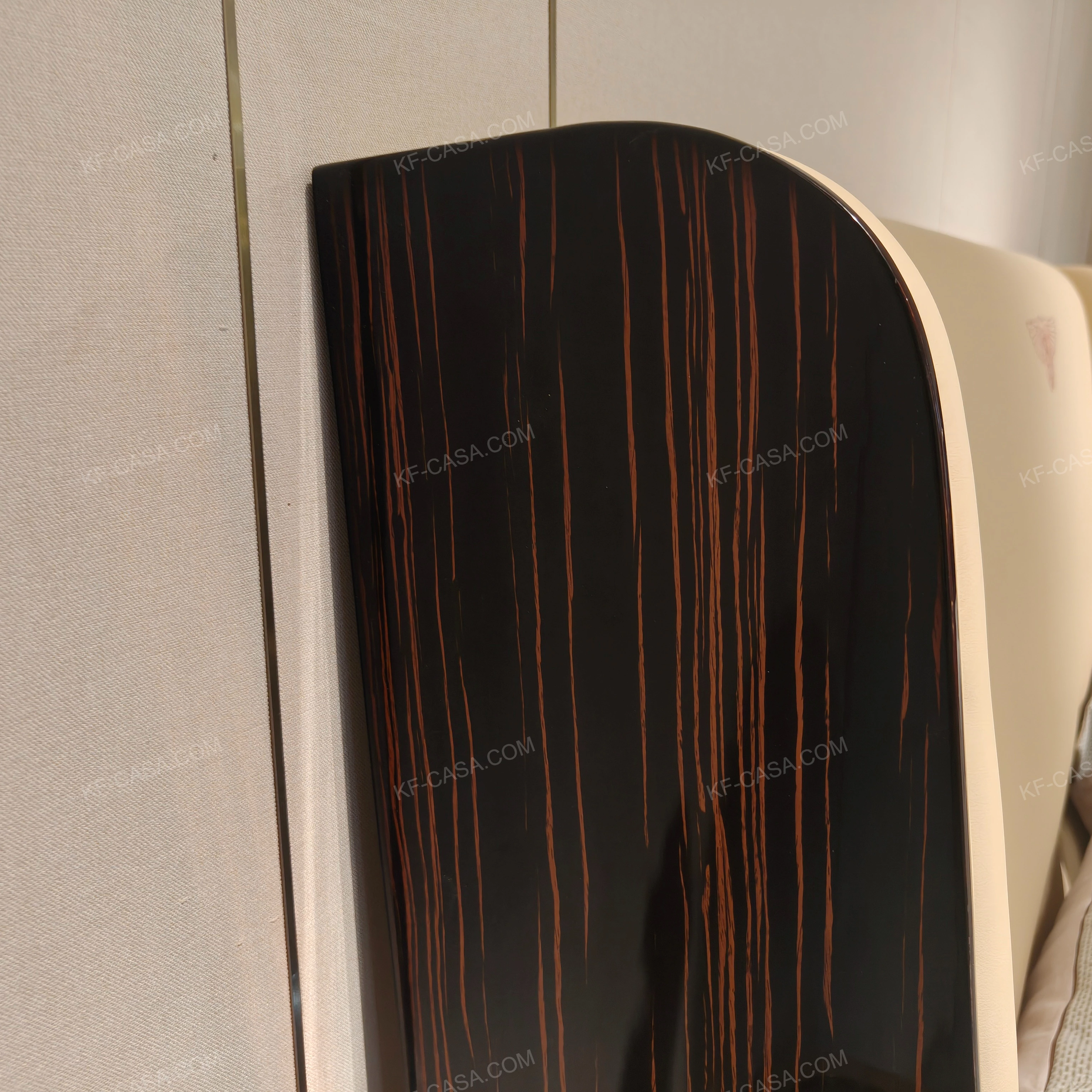 Cream Leather Upholstered Bed with Dark Natural Wood Veneer Trim, Embossed Brand Emblem & Copper-Accented Hardware